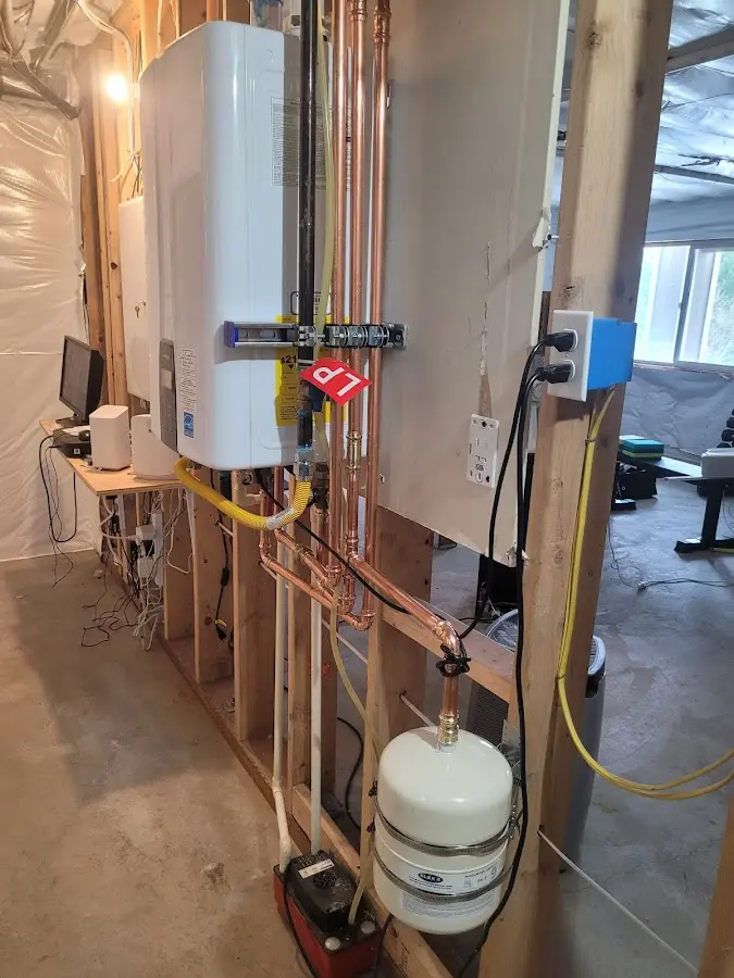 Licensed plumber repairing a kitchen sink in Surfside Beach