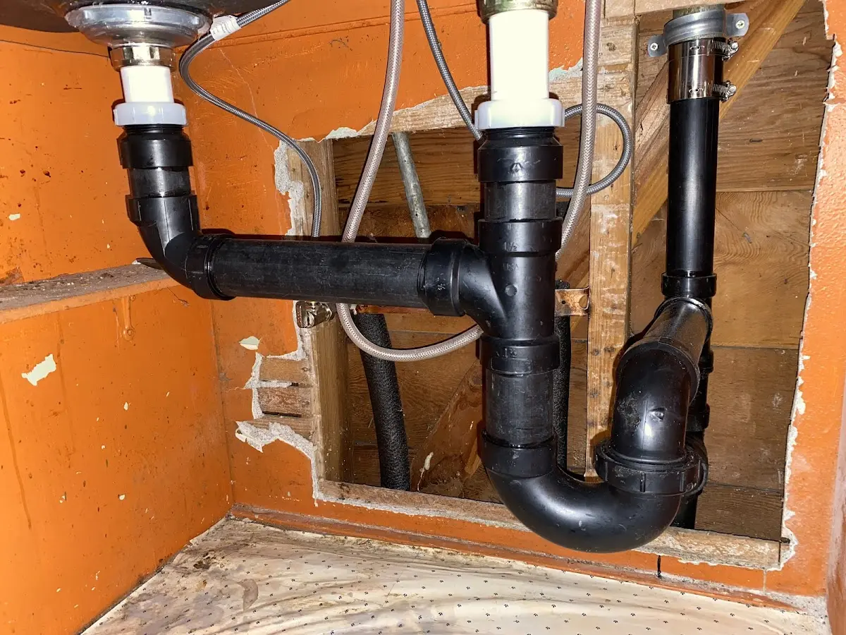 Professional Garbage Disposal Repair equipment and tools on the job in Surfside Beach
